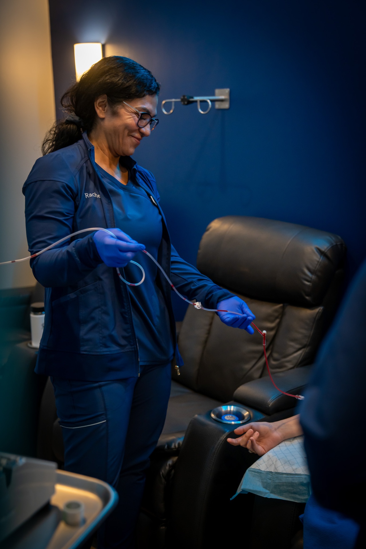 Licensed RN monitoring an Ozone UV IV session at iCRYO Highland Village