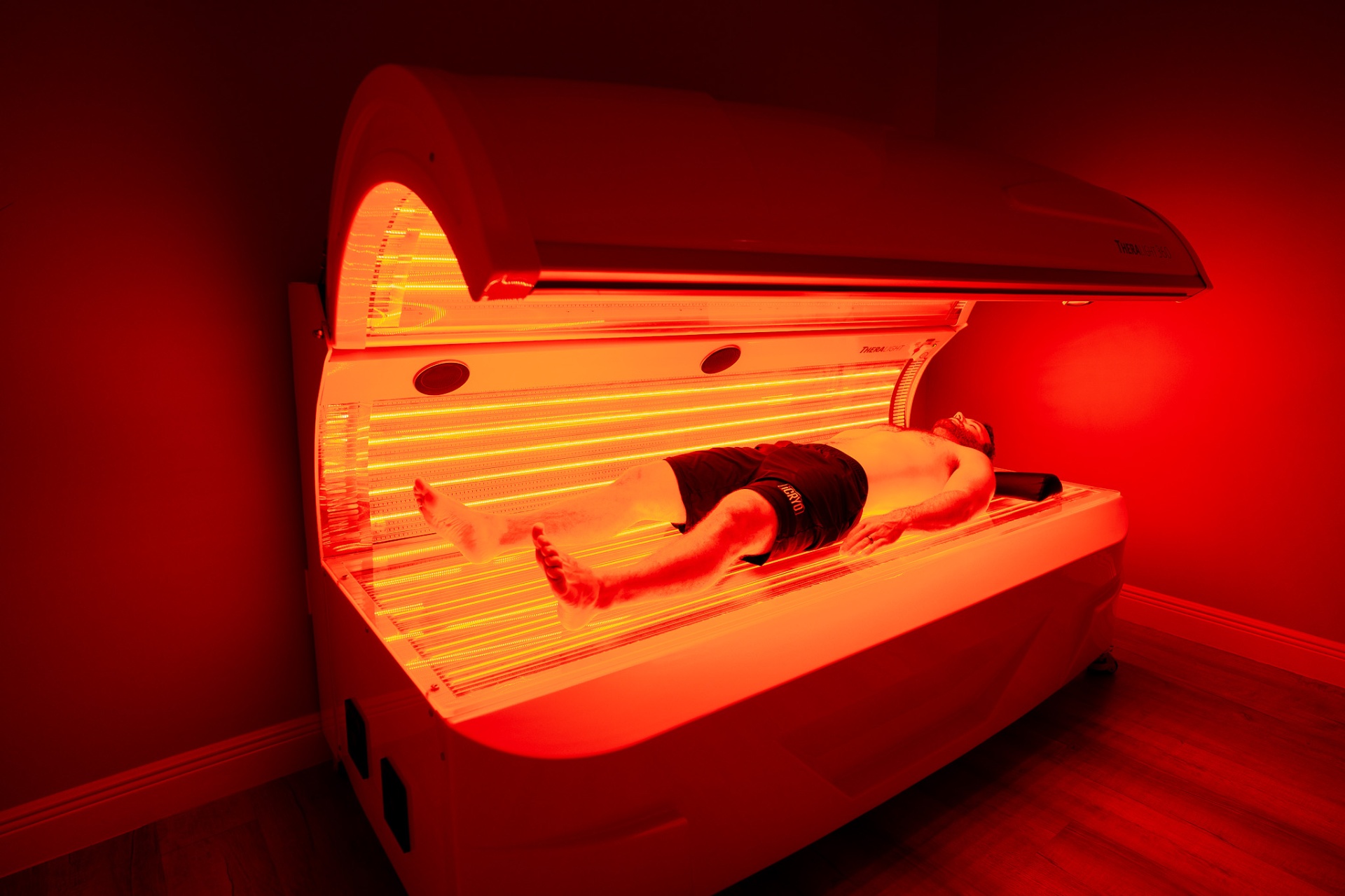 Client receiving red light therapy at iCRYO Highland Village