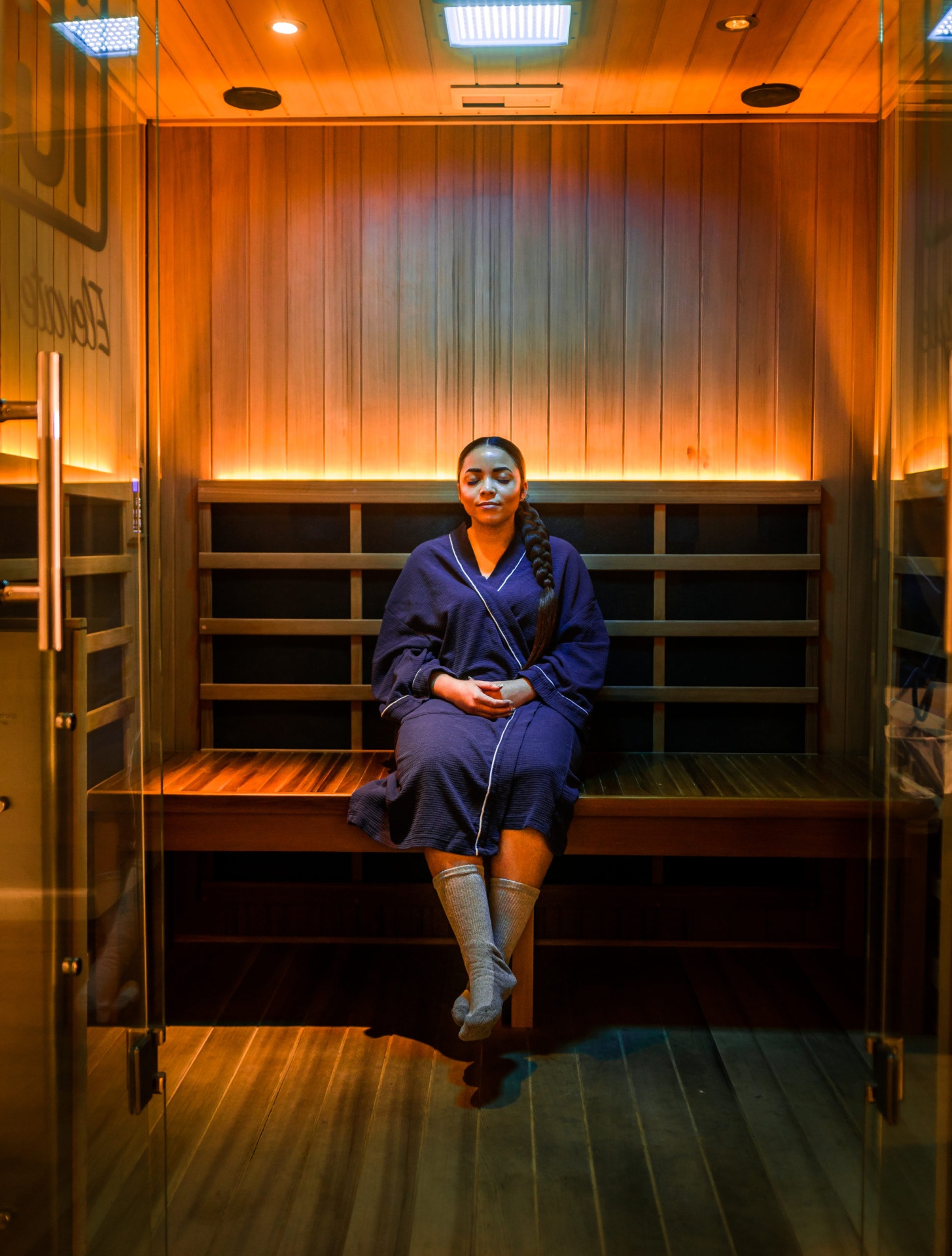 Guest sweating in the infrared sauna at iCRYO Highland Village